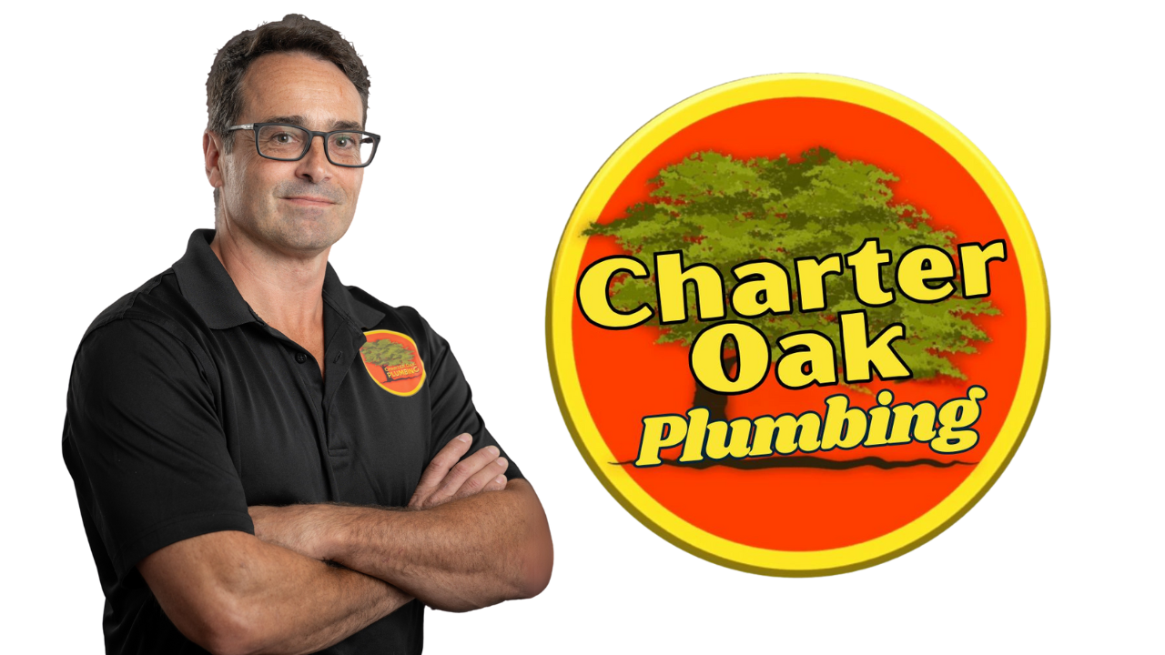 Charter Oak banner Sout tnklss water Owner of Charter Oak Plumbing wearing company uniform, confidently smiling with arms crossed — expert plumber serving Southington, CT and surrounding areas.